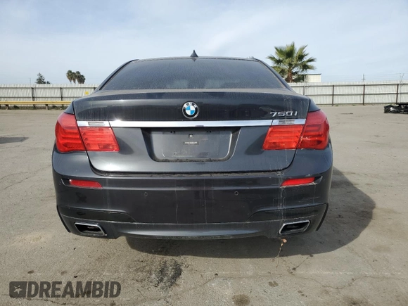 2012 BMW 7 Series 750i with VIN WBAKA8C58CDS99694, listed as a Copart auction lot 46828435 with 131,458 mi miles and Salvage title. Bid and sale history available at DreamBid. Image 6.