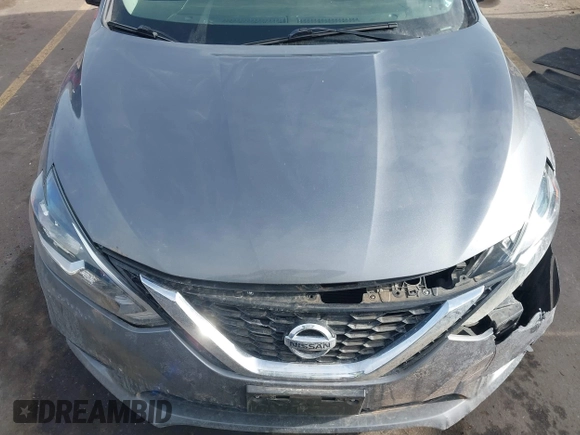 2019 Nissan Sentra S z VIN 3N1AB7AP4KY424604, wystawiony jako IAAI lot #41298124 z przebiegiem 73 000 mil mil oraz . Historia ofert i sprzedaży dostępna na DreamBid. Obrazek 10.