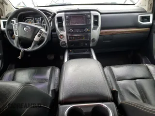 2016 Nissan Titan XD PRO-4X with VIN 1N6BA1F45GN517682, listed as a Copart auction lot 79774674 with 149,675 mi miles and Salvage Title. Bid and sale history available at carsss.com. Image 8.