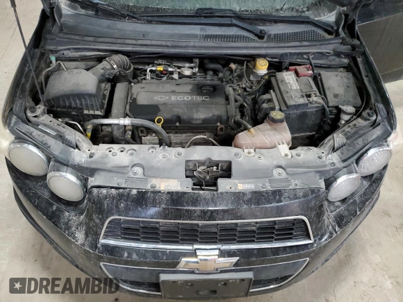 2012 Chevrolet Sonic LTZ z VIN 1G1JE5SH3C4151930, wystawiony jako Copart lot #84337574 z przebiegiem 125 606 mil mil oraz Szkoda całkowita • Salvage title. Historia ofert i sprzedaży dostępna na DreamBid. Obrazek 11.