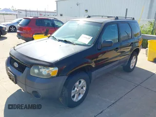 2006 Ford Escape XLT with VIN 1FMYU03176KA55498, listed as a IAAI auction lot 42499429 with 156,298 mi miles and . Bid and sale history available at DreamBid. Image 2.
