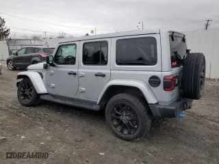 2024 Jeep Wrangler 4xe Sahara with VIN 1C4RJXP69RW162663, listed as a Copart auction lot 50141385 with 7,156 mi miles and Salvage Title. Bid and sale history available at carsss.com. Image 2.