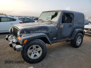 2006 Jeep Wrangler Rubicon with VIN 1J4FA69S06P771793, listed as a Copart auction lot 82874734 with 134,241 mi miles and Salvage title. Bid and sale history available at DreamBid. Image 1.