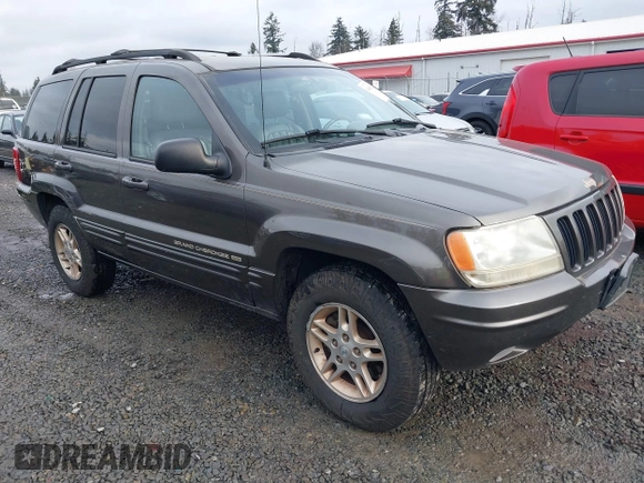 1999 Jeep Grand Cherokee Limited with VIN 1J4GW68N7XC739479, listed as a IAAI auction lot 41448323 with 129,840 mi miles. Bid and sale history available at carsss.com. Image 1.