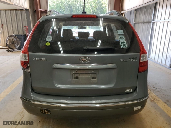 2010 Hyundai Elantra Touring SE with VIN KMHDC8AE7AU060896, listed as a Copart auction lot 71583564 with 123,991 mi miles and Salvage Title. Bid and sale history available at carsss.com. Image 6.