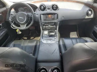 2015 Jaguar XJ with VIN SAJWJ1CD1F8V75232, listed as a Copart auction lot 57605685 with 146,314 mi miles and Salvage title. Bid and sale history available at DreamBid. Image 8.