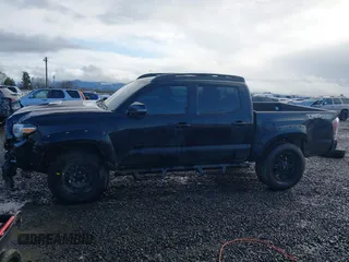 2020 Toyota Tacoma SR5 z VIN 5TFCZ5AN9LX216032, wystawiony jako IAAI lot #41448197 z przebiegiem 128 581 mil mil oraz . Historia ofert i sprzedaży dostępna na DreamBid. Obrazek 15.