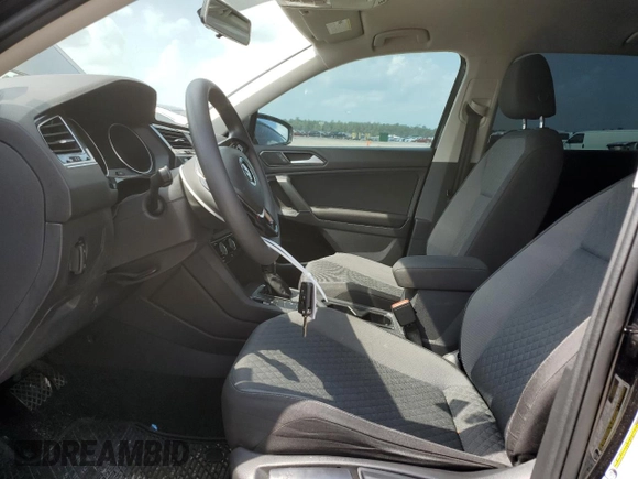 2018 Volkswagen Tiguan S with VIN 3VV1B7AX9JM020833, listed as a Copart auction lot 54539565 with 69,904 mi miles and Salvage title. Bid and sale history available at DreamBid. Image 7.