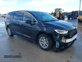2023 Chrysler Pacifica Touring L with VIN 2C4RC1BG9PR616360, listed as a IAAI auction lot 42590746 with 67,068 mi miles and . Bid and sale history available at DreamBid. Image 1.