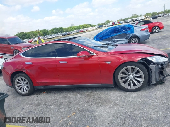 2016 Tesla Model S 70 with VIN 5YJSA1E16GF135833, listed as a IAAI auction lot 42084421 with 97,615 mi miles and . Bid and sale history available at DreamBid. Image 14.