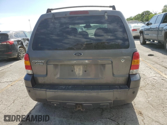 2005 Ford Escape Limited with VIN 1FMYU041X5KC72704, listed as a Copart auction lot 57819655 with 179,469 mi miles and Salvage title. Bid and sale history available at DreamBid. Image 6.