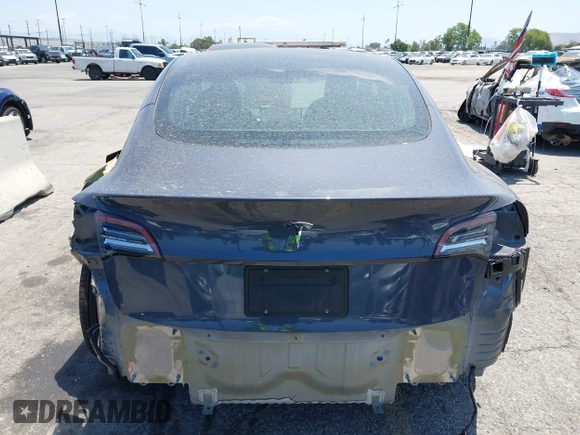2023 Tesla Model 3 with VIN 5YJ3E1EA4PF400306, listed as a IAAI auction lot 42398603 with 18,551 mi miles and . Bid and sale history available at DreamBid. Image 17.