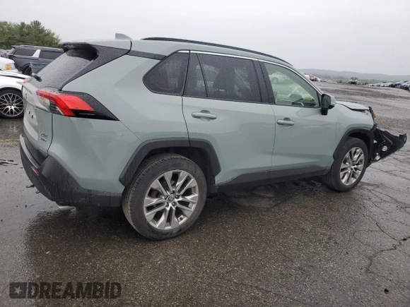 2021 Toyota RAV4 XLE Premium with VIN JTMA1RFV0MD074834, listed as a Copart auction lot 58466965 with 71,623 mi miles and Salvage title. Bid and sale history available at DreamBid. Image 3.