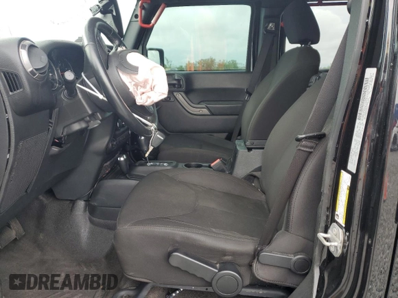 2018 Jeep Wrangler Unlimited Sport S with VIN 1C4BJWDG0JL818800, listed as a Copart auction lot 56648505 with 114,011 mi miles and Salvage Title. Bid and sale history available at DreamBid. Image 7.