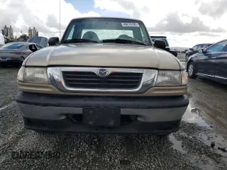 1999 Mazda B-Series Truck SX z VIN 4F4YR12C4XTM21614, wystawiony jako Copart lot #49276195 z przebiegiem 155 420 mil mil oraz Czysty tytuł • Clean title. Historia ofert i sprzedaży dostępna na DreamBid. Obrazek 5.
