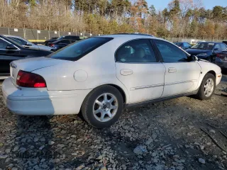 2002 Mercury Sable LS with VIN 1MEHM55S52A642482, listed as a Copart auction lot 83192774 with 153,414 mi miles and Salvage Title. Bid and sale history available at DreamBid. Image 3.