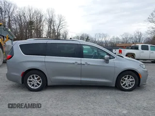 2021 Chrysler Pacifica Touring L with VIN 2C4RC1BG3MR542543, listed as a IAAI auction lot 41657073 with 118,833 mi miles and . Bid and sale history available at DreamBid. Image 14.
