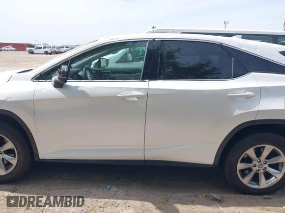 2019 Lexus RX 350 z VIN 2T2ZZMCA4KC126214, wystawiony jako IAAI lot #41881877 z przebiegiem 91 419 mil mil oraz . Historia ofert i sprzedaży dostępna na DreamBid. Obrazek 14.