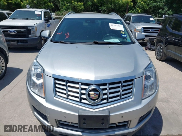 2015 Cadillac SRX Luxury Collection z VIN 3GYFNBE35FS627640, wystawiony jako IAAI lot #42262843 z przebiegiem 211 669 mil mil oraz . Historia ofert i sprzedaży dostępna na DreamBid. Obrazek 6.