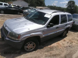2004 Jeep Grand Cherokee Laredo z VIN 1J4GW48SX4C309998, wystawiony jako IAAI lot #42307167 z przebiegiem 306 912 mil mil oraz . Historia ofert i sprzedaży dostępna na DreamBid. Obrazek 17.
