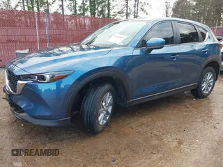 2023 Mazda CX-5 2.5 S Carbon Edition with VIN JM3KFBCM2P0235177, listed as a IAAI auction lot 41209889 with 15,588 mi miles. Bid and sale history available at carsss.com. Image 17.