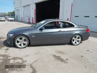2007 BMW 3 Series 335i with VIN WBAWL73587PX47653, listed as a IAAI auction lot 41428352 with 225,457 mi miles. Bid and sale history available at carsss.com. Image 14.
