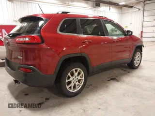2015 Jeep Cherokee Latitude with VIN 1C4PJMCB4FW687618, listed as a IAAI auction lot 41945132 with 264,782 mi miles and . Bid and sale history available at carsss.com. Image 4.
