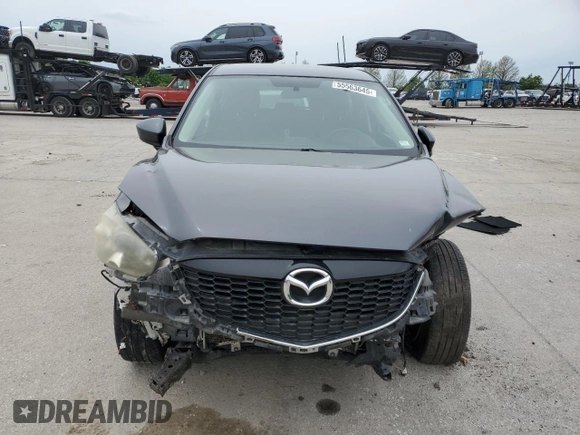 2014 Mazda CX-5 Touring z VIN JM3KE4CY2E0368729, wystawiony jako Copart lot #55563645 z przebiegiem 204 521 mil mil oraz Szkoda całkowita • Salvage title. Historia ofert i sprzedaży dostępna na DreamBid. Obrazek 5.