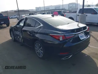 2021 Lexus ES with VIN 58ADZ1B11MU085680, listed as a IAAI auction lot 41447914 with 29,852 mi miles. Bid and sale history available at carsss.com. Image 3.