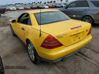 1999 Mercedes-Benz SLK-Class with VIN WDBKK47F3XF085992, listed as a Copart auction lot 76931354 with 0 mi miles and Salvage Title. Bid and sale history available at carsss.com. Image 2.