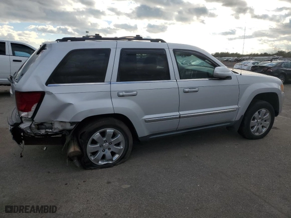 2009 Jeep Grand Cherokee Limited with VIN 1J8HR58T69C523337, listed as a Copart auction lot 82992464 with 156,522 mi miles and Salvage Title. Bid and sale history available at carsss.com. Image 3.