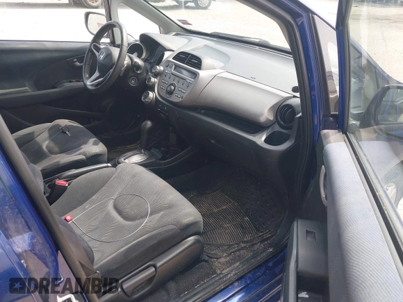 2011 Honda Fit Sport with VIN JHMGE8H57BC021538, listed as a IAAI auction lot 42263684 with 144,164 mi miles and . Bid and sale history available at DreamBid. Image 5.
