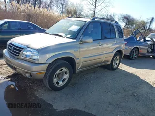 2005 Suzuki Grand Vitara LX with VIN JS3TD62V454200331, listed as a IAAI auction lot 41896812 with 122,974 mi miles and . Bid and sale history available at DreamBid. Image 2.