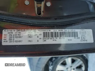 2015 Dodge Journey SXT with VIN 3C4PDCCG6FT602779, listed as a Copart auction lot 44929525 with 122,673 mi miles and Salvage title. Bid and sale history available at DreamBid. Image 14.