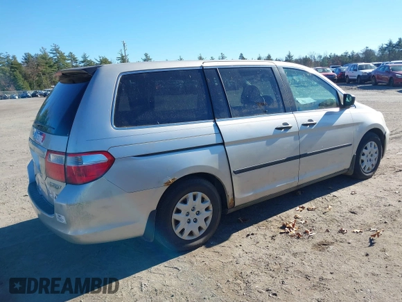 2005 Honda Odyssey LX with VIN 5FNRL382X5B097268, listed as a IAAI auction lot 40809971 with 286,685 mi miles and . Bid and sale history available at DreamBid. Image 4.