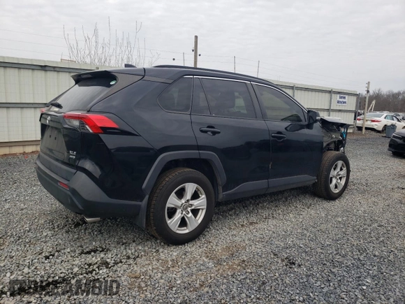 2019 Toyota RAV4 XLE with VIN JTMP1RFV9KD506960, listed as a Copart auction lot 50242025 with 102,157 mi miles and Salvage Title. Bid and sale history available at DreamBid. Image 3.