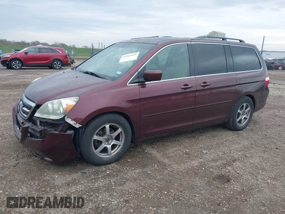 2007 Honda Odyssey Touring with VIN 5FNRL38847B048235, listed as a IAAI auction lot 41963652 with 176,412 mi miles. Bid and sale history available at carsss.com. Image 19.