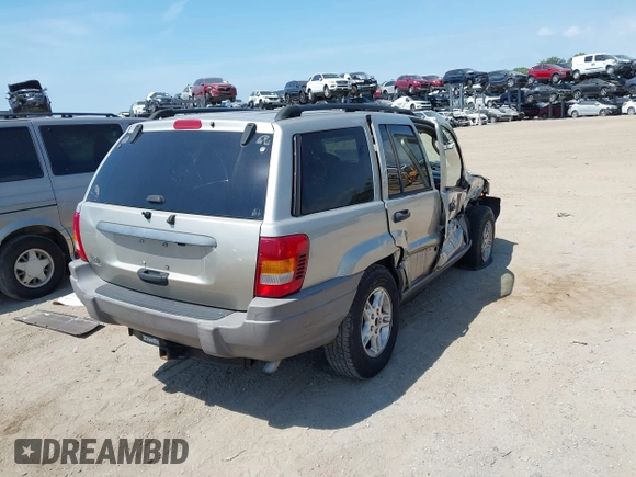 2004 Jeep Grand Cherokee Laredo z VIN 1J4GW48SX4C283922, wystawiony jako IAAI lot #42306869 z przebiegiem 263 812 mil mil oraz . Historia ofert i sprzedaży dostępna na DreamBid. Obrazek 4.
