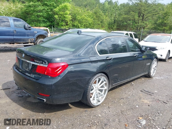 2011 BMW 7 Series 740Li with VIN WBAKB4C5XBC392890, listed as a IAAI auction lot 42108817 with 162,874 mi miles. Bid and sale history available at carsss.com. Image 4.