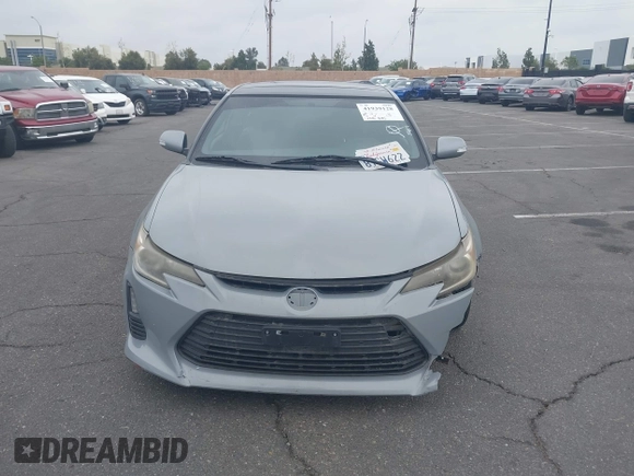 2014 Scion tC with VIN JTKJF5C71E3077886, listed as a IAAI auction lot 41939128 with 138,845 mi miles. Bid and sale history available at carsss.com. Image 12.