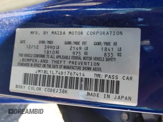 2013 Mazda 3 i Touring z VIN JM1BL1L74D1767414, wystawiony jako IAAI lot #42336893 z przebiegiem 125 000 mil mil oraz . Historia ofert i sprzedaży dostępna na DreamBid. Obrazek 9.