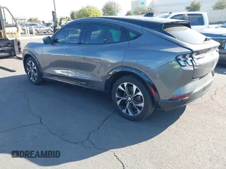 2023 Ford Mustang Mach-E Premium z VIN 3FMTK3RMXPMA45920, wystawiony jako IAAI lot #41610884 z przebiegiem 43 476 mil mil oraz . Historia ofert i sprzedaży dostępna na DreamBid. Obrazek 3.