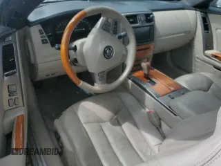 2006 Cadillac XLR z VIN 1G6YV36A365601441, wystawiony jako Copart lot #73945994 z przebiegiem Nie podano mil oraz Szkody całkowita. Historia ofert i sprzedaży dostępna na DreamBid. Obrazek 8.