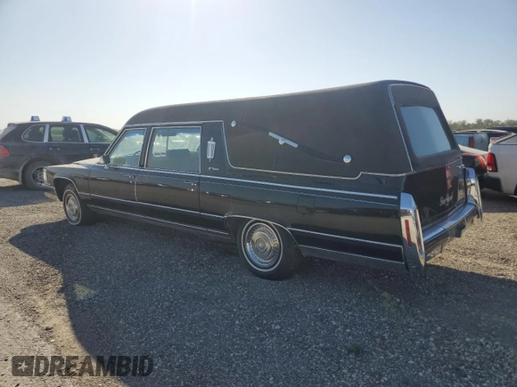 1992 Cadillac Brougham z VIN 1G6DW54E9NR713312, wystawiony jako Copart lot #71659794 z przebiegiem 41 467 mil mil oraz Tytuł czysty. Historia ofert i sprzedaży dostępna na DreamBid. Obrazek 2.