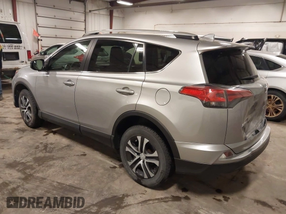 2016 Toyota RAV4 LE with VIN 2T3BFREV8GW509257, listed as a IAAI auction lot 41807349 with 216,031 mi miles. Bid and sale history available at carsss.com. Image 3.