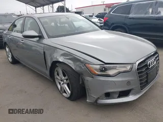 2015 Audi A6 Premium Plus z VIN WAUGFAFC6FN009203, wystawiony jako IAAI lot #42242726 z przebiegiem 69 163 mil mil oraz . Historia ofert i sprzedaży dostępna na DreamBid. Obrazek 1.