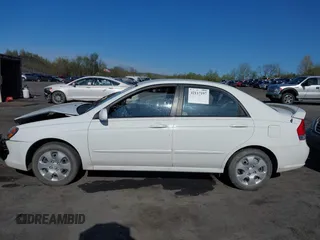 2009 Kia Spectra EX z VIN KNAFE222595616439, wystawiony jako IAAI lot #42117197 z przebiegiem 79 882 mil mil oraz . Historia ofert i sprzedaży dostępna na DreamBid. Obrazek 14.