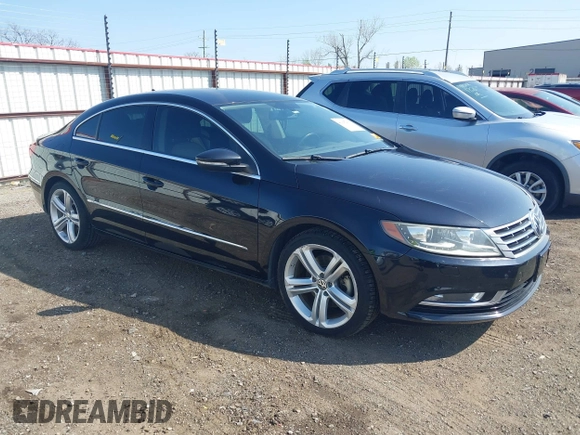 2013 Volkswagen CC Sport with VIN WVWBN7AN9DE518789, listed as a IAAI auction lot 41915400 with 114,847 mi miles. Bid and sale history available at carsss.com. Image 1.