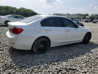 2015 BMW 3 Series 328i xDrive with VIN WBA3B3G52FNT19323, listed as a Copart auction lot 61873015 with 110,893 mi miles and Salvage title. Bid and sale history available at DreamBid. Image 3.