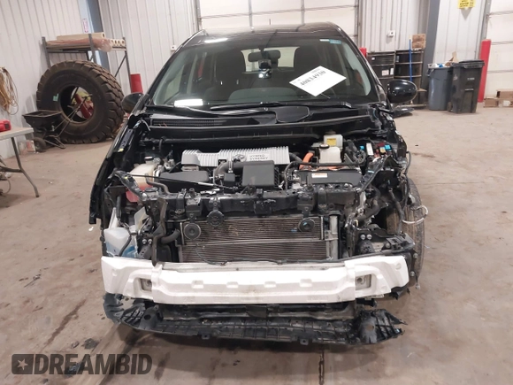 2017 Toyota Prius v Two with VIN JTDZN3EU0HJ063367, listed as a IAAI auction lot 40834930 with 153,045 mi miles. Bid and sale history available at carsss.com. Image 6.